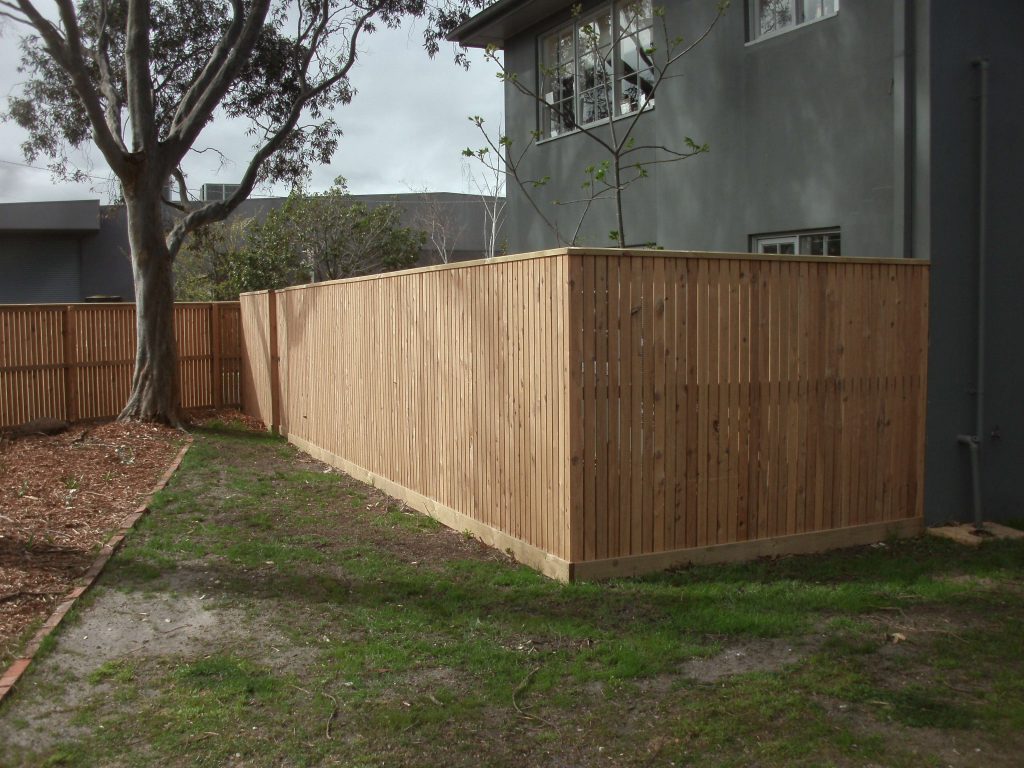 Cypress Picket fence with Gabled Lipped Capping and concealed posts - corner view