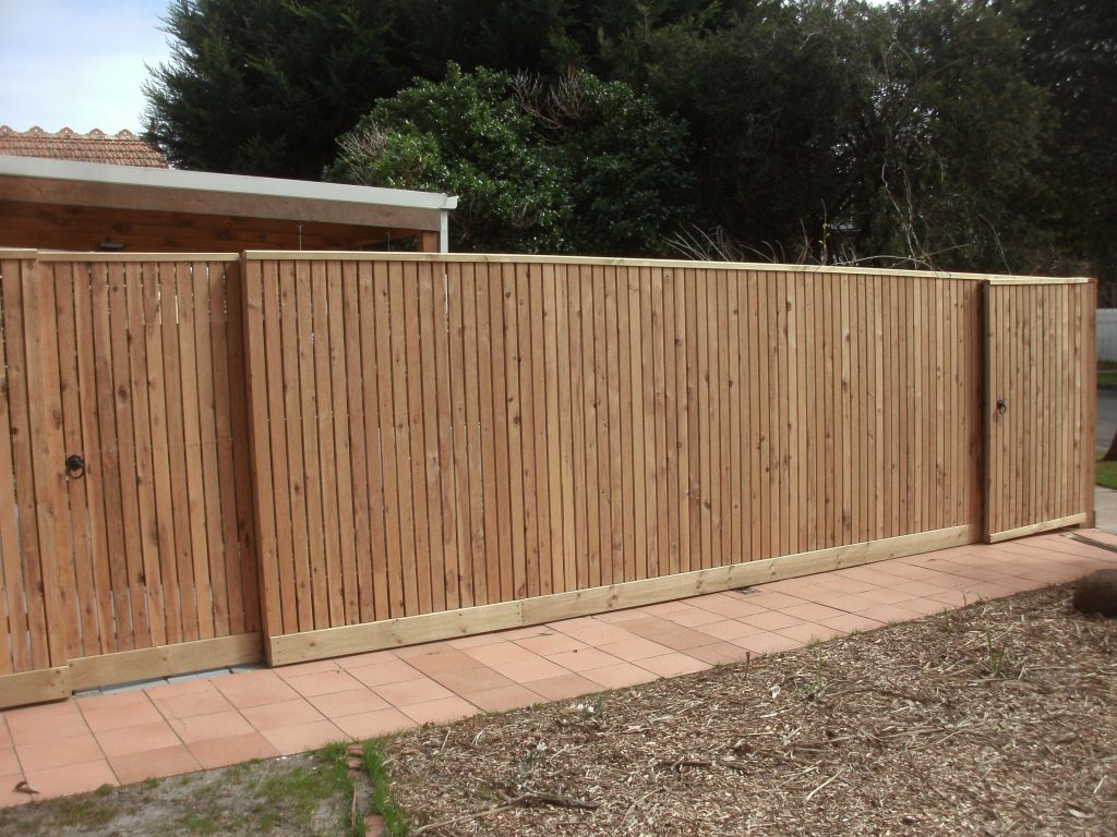 Cypress Picket fence with Gabled Lipped Capping and concealed posts