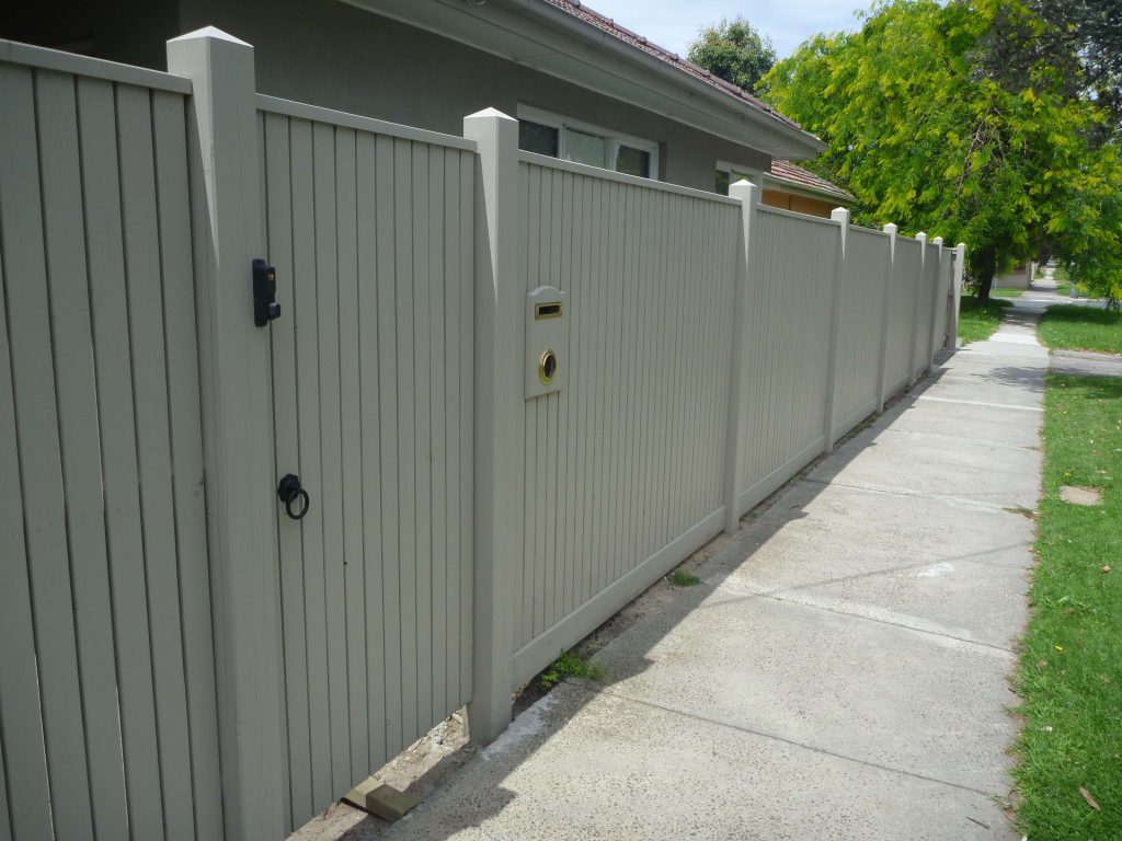 Picket fence with Exposed posts and Gabled Lipped Capping