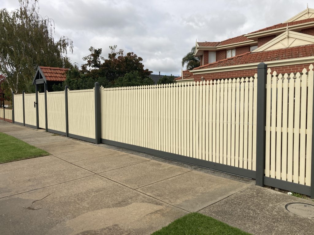 Feature picket fence with sliding and single gates